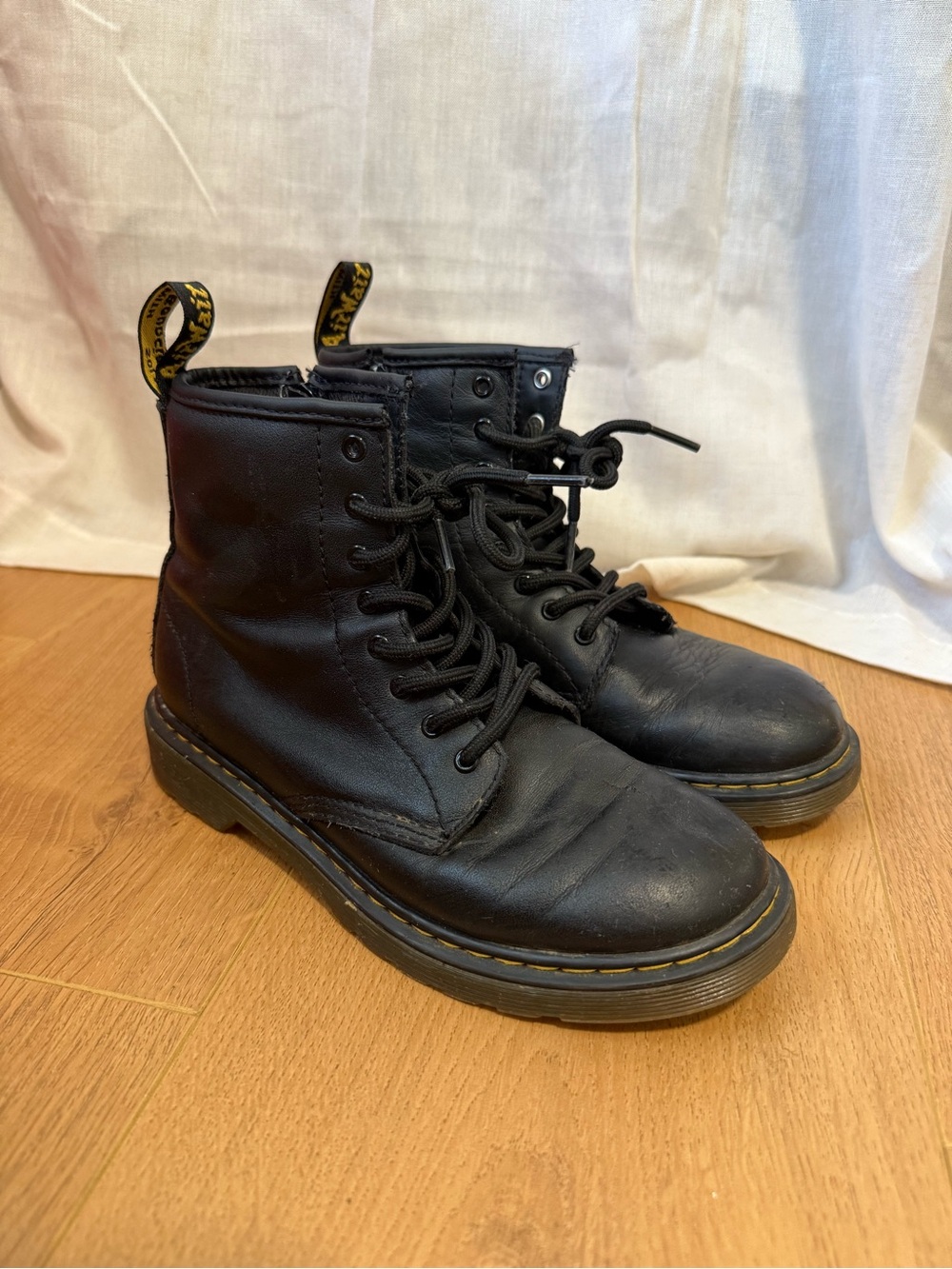 Dr. Martens Black Leather Lace-Up Boots with Yellow Heel Loop